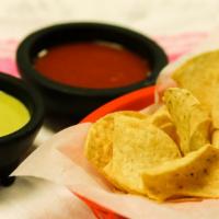 Chips and Salsa · Chips served with cilantro salsa.