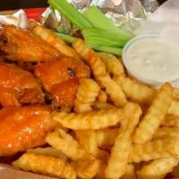 Wing Basket Plate · 6 wings, celery and spices fries ranch or blue cheese.