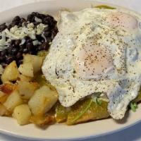Chilaquiles Plate · Fried tortilla chips smothered with spicy tomatillo sauce, topped with sour cream, cilantro,...