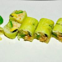 Spicy Mango Lobster Roll · Mango, lobster salad, avocado, black tobiko and tempura flakes wrapped with soy paper