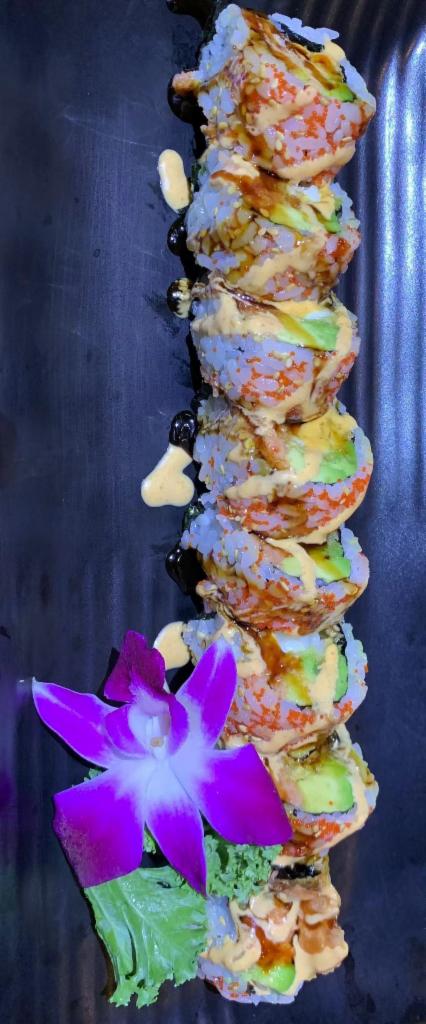 Gold Lobster Roll · Spicy tuna and avocado with tempura lobster inside and tobiko outside. 