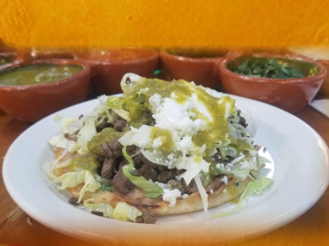 Special 3 Sopes with Meat · 3 pieces. Small handmade corn tortilla, smothered with beans, onion, cilantro. Choice of meat. Covered with lettuce, cheese and sour cream.