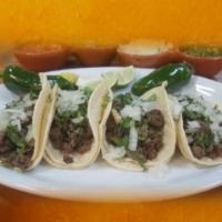 Special 4 Tacos  Asada · Steak, onion & Cilantro