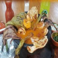 Molcajete Mixto · Chicken breast, steak, shrimp, Mexican sausage (chorizo), nopal, fried jalapeno bullied and ...