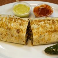 Burrito · Big flour tortilla, filled with your choice of meat, rice, beans, onions, cilantro, sour cre...