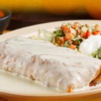 Chimichanga · Flour burrito deep-fried with your choice of meat, covered with cheese dip, lettuce, sour cr...