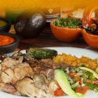Carnitas · Pork carnitas, fried onions, fried jalapenos, avocado, tomato, pico de gallo, rice and beans.