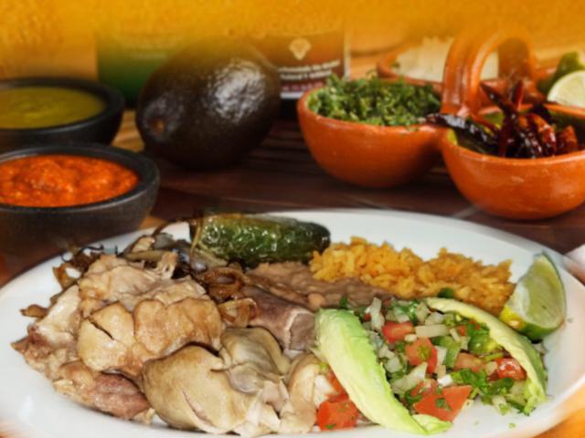 Carnitas · Pork carnitas, fried onions, fried jalapenos, avocado, tomato, pico de gallo, rice and beans.