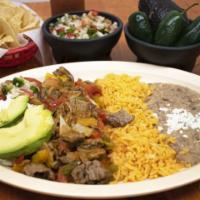 Steak Ranchero · Bell pepper, onion, tomato, special sauce tomatoe. Served with rice and beans