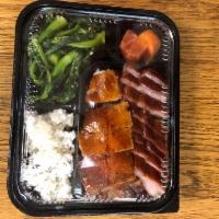 Roast Pork and Roast Duck on Rice （叉烧烧鸭饭） · BBQ Cha siu and BBQ duck over rice.