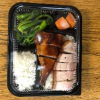 Roast Duck and Pork Belly on Rice （火鸭火肉饭） · BBQ Duck and crispy pork belly over rice