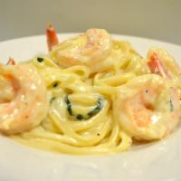Linguini Alfredo with shrimp · Served with white creamy sauce, basil,italian bread and parmesan cheese