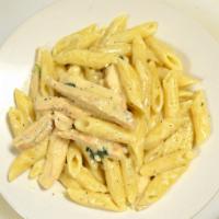 Penne with Chicken Alfredo sauce · Served with white creamy sauce, basil, Parmesan cheese and bread.