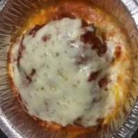 Lasagna · Made with ground beef.italian bread and parmesan cheese