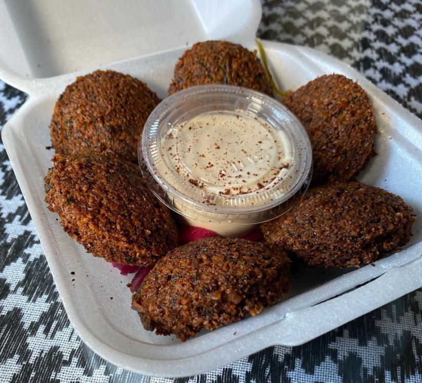 Falafel · 6 pieces. Fried ball made from beans. Vegetarian.