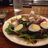 Mediterranean Salad · Greens, hummus, feta cheese, black olives and hard boiled eggs. Dressing served on the side. 
