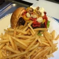 Peppercorn Burger · Spicy peppercorn crust. Served with tomato, lettuce, and french fries.