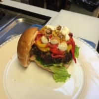 Tunisian Burger · Goat cheese, roasted pepper and Harissa mayonnaise. Served with tomato, lettuce, and french ...