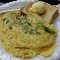 Western Omelet · Ham, onion, green peppers, mushrooms and tomato.