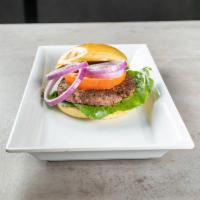 Classic Heifer Burger · 8 oz. of our freshly ground special blended beef served on a brioche roll with lettuce, toma...
