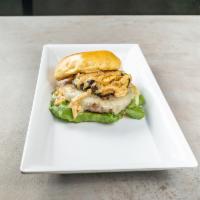 The Godfather Burger · 1/2 lb. of our special blend topped with grilled marinated eggplant, mozzarella cheese and r...