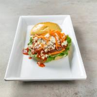 Buffaloed Burger · The same awesome blend topped with crumbled blue cheese, spicy Buffalo sauce and shredded ca...