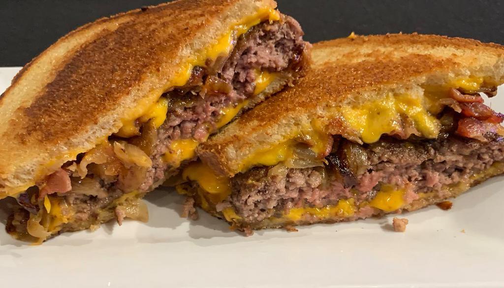 The Patty Melt Supreme Burger · Our unbeatable fresh ground beef on grilled rye bread with American cheese, bacon and caramelized onions. 