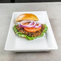 Black Bean Burger · Our own homemade fresh black bean burger veggie burger served with lettuce tomato and onions...