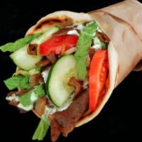 Chicken Kabob Pita · On a soft pita bread with grilled onions, lettuce and cabbage mix, tomatoes, cucumbers, gril...
