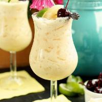 Piña Colada (served with Ice) · Must be 21 to purchase. The epitome of sunshine and white sandy beaches, the piña colada can...