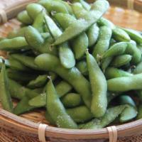 Edamame · Lightly salted boiled soy bean pods. 
