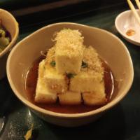 Agedashi Tofu · Deep fried Tofu, with fish flakes and shredded seaweed on top, comes with a side of Japanese...