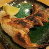 Hamachi Kama · Grilled yellowtail neck.  Comes with a side of Japanese special sauce