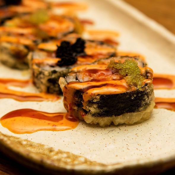 Godzilla Roll · Spicy tuna (with crunch) and avocado inside the roll, deep fried.   Scallion and tobiko and spicy mayo on top, sliced into 6 pieces