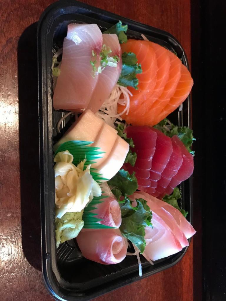 18 Piece Sashimi Deluxe · Served with miso soup or salad. 