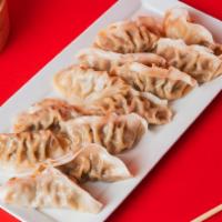 12 Pack Dumplings · Steamed with your choice of filling between Ginger Chicken and Green Vegetable.