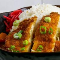 Japanese Curry  w/ Panko Chicken · House-made curry. Pleasantly sweet and savory with potatoes and carrots, topped with white m...