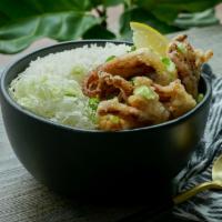 Ika Geso Donburi · Crispy breaded squid legs seasoned with salt, pepper, and lemon on top of a steaming bed of ...