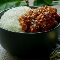 Red Dragon Rice Bowl · Tender crispy chicken tossed in a spicy thai chili sauce, on a bed of steamed white rice top...