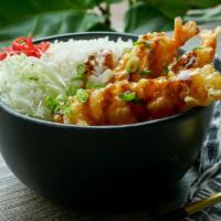 Tempura Shrimp Rice Bowl · Crispy tempura shrimp drizzled with a spicy citrus sauce ＆ kewpie, on top of shredded cabbag...