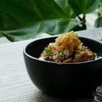 Pork Belly Rice · Chopped seared pork belly on steamed white rice, topped with a sweet onion drizzle and sprin...