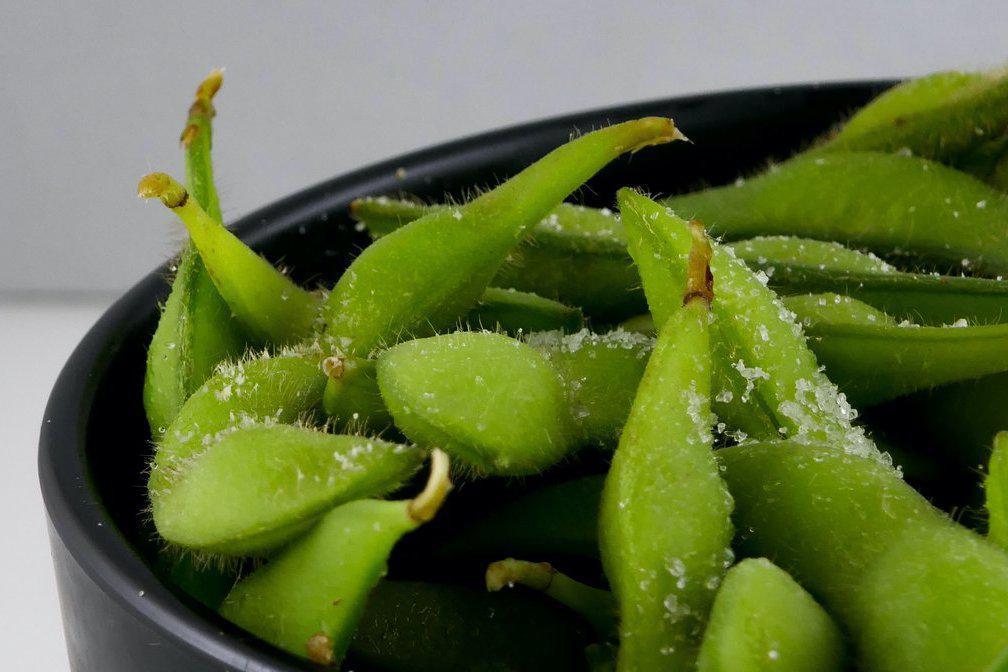 Edamame · Green soybeans served hot with sea salt.