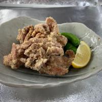 Karaage · Lightly salted crispy fried chicken thighs served with 2 sauces of your choice, ponzu sauce,...