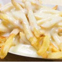 Disco Fries · Fries with melted mozzarella and brown gravy.