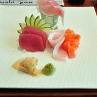 Sashimi Regular Entree · 12 pieces of assorted fish. Chef's choice. Served with miso soup or salad. 