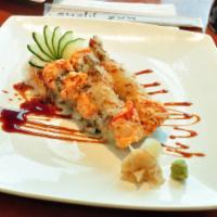 Queen Roll · Shrimp tempura and cucumber inside, with spicy lobster salad and crab meat outside.
