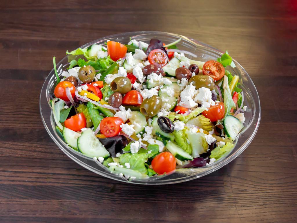 Greek Salad · Crisp romaine lettuce with feta cheese, peppers, cucumber, tomato, red onion and Kalamata olives.
