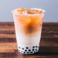 Milk Black Tea · Served with fresh lactose free milk, cold only.