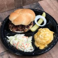 Chopped Brisket Sandwich with 1 Side · Freshly chopped beef brisket sandwich, pilled high to satisfy any bbq craving. It comes with...