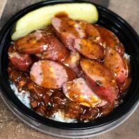 Kid's Texas Sausage Bowl · Jalapeno and cheddar or cracked pepper smoked sausage, sliced over jasmine rice and Smokin’ ...